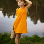 Sukienka dziecięca z wełny merynosów pomarańczowa
