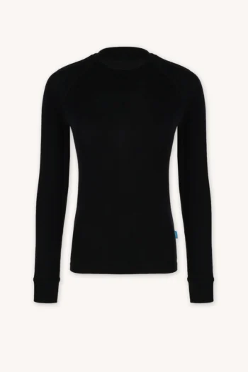Bielizna termoaktywna z wełny merino 100% damska góra czarna, z długim rękawem. Ma ściągacze przy mankietach i małą niebieską metkę na bocznym szwie — idealna na chłodne dni, kiedy potrzeba dodatkowego ciepła.