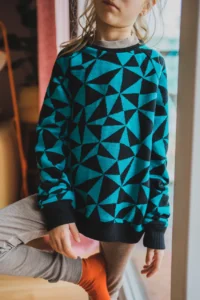 Bluza z wełny merino prosta dla dzieci w trójkąty
