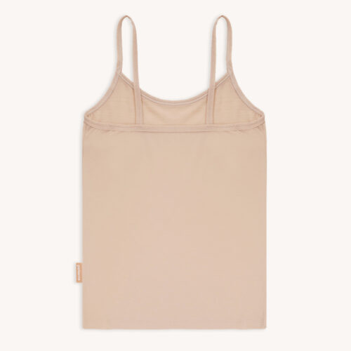 Podkoszulka termoaktywna z wełny merino na ramiączkach cielista jest ułożona płasko na jasnym tle, podkreślając jej prosty i minimalistyczny design.