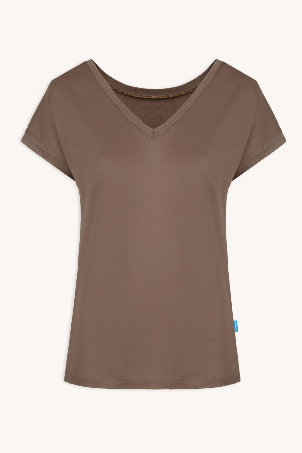 Męska koszulka z długim rękawem z kobaltowej wełny merynosów (Koszulka z wełny merynosów) jest prezentowana na jasnym tle.