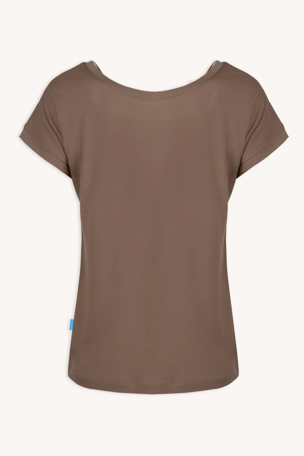 Męska kobaltowo-niebieska koszulka z wełny merynosów z długim rękawem o luźnym kroju, pokazana od tyłu na białym tle. Koszulka ma szeroki dekolt i małą niebieską metkę po lewej stronie.