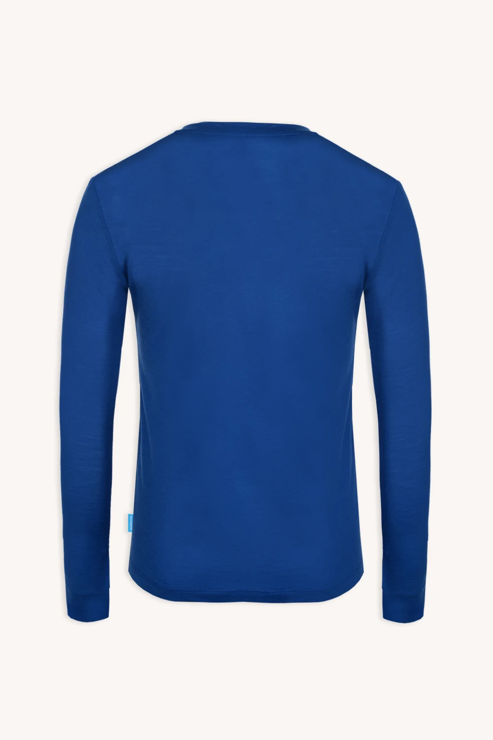 Koszulka z wełny merino z długim rękawem męska kobaltowa pokazana od tyłu na jasnym tle, bez widocznych logotypów czy wzorów, z okrągłym dekoltem.