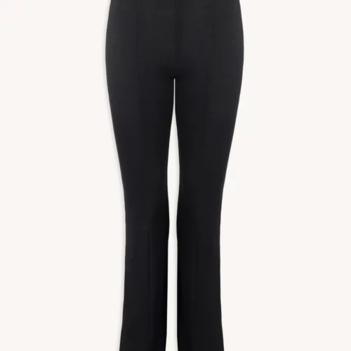 Legginsy z wełny merino flare czarne o wysokim stanie, dopasowanym kroju, rozszerzanych nogawkach i rozcięciami z przodu, prezentowane na jasnym tle.
